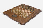 Angled view of the quilted carved board with a bronze Tree of Life set into the border