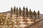 Detail of the cast-metal armies facing off across the diamond-carved board