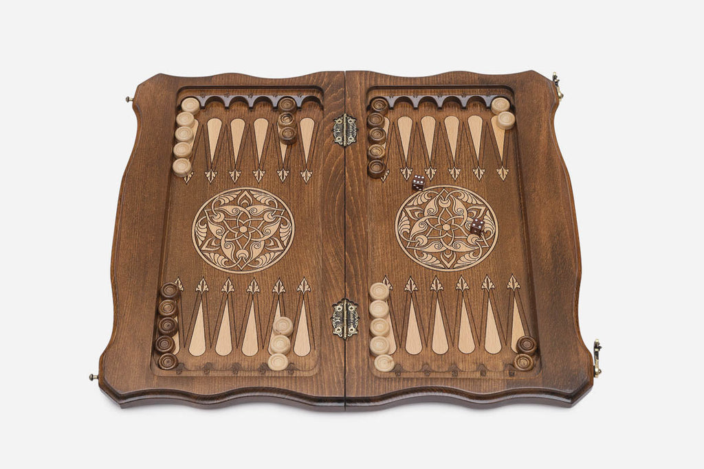 The opened case showing the backgammon layout with its wooden checkers and dice