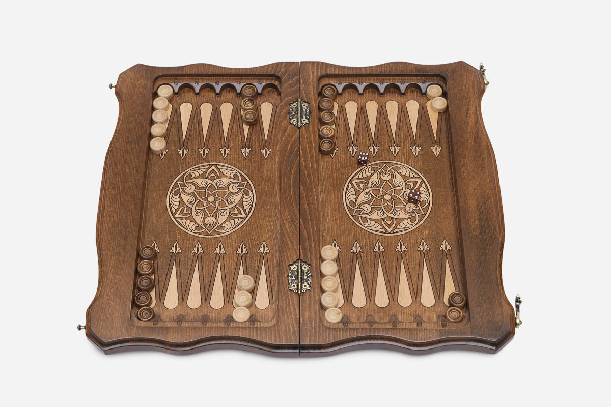 The opened case showing the backgammon layout with its wooden checkers and dice
