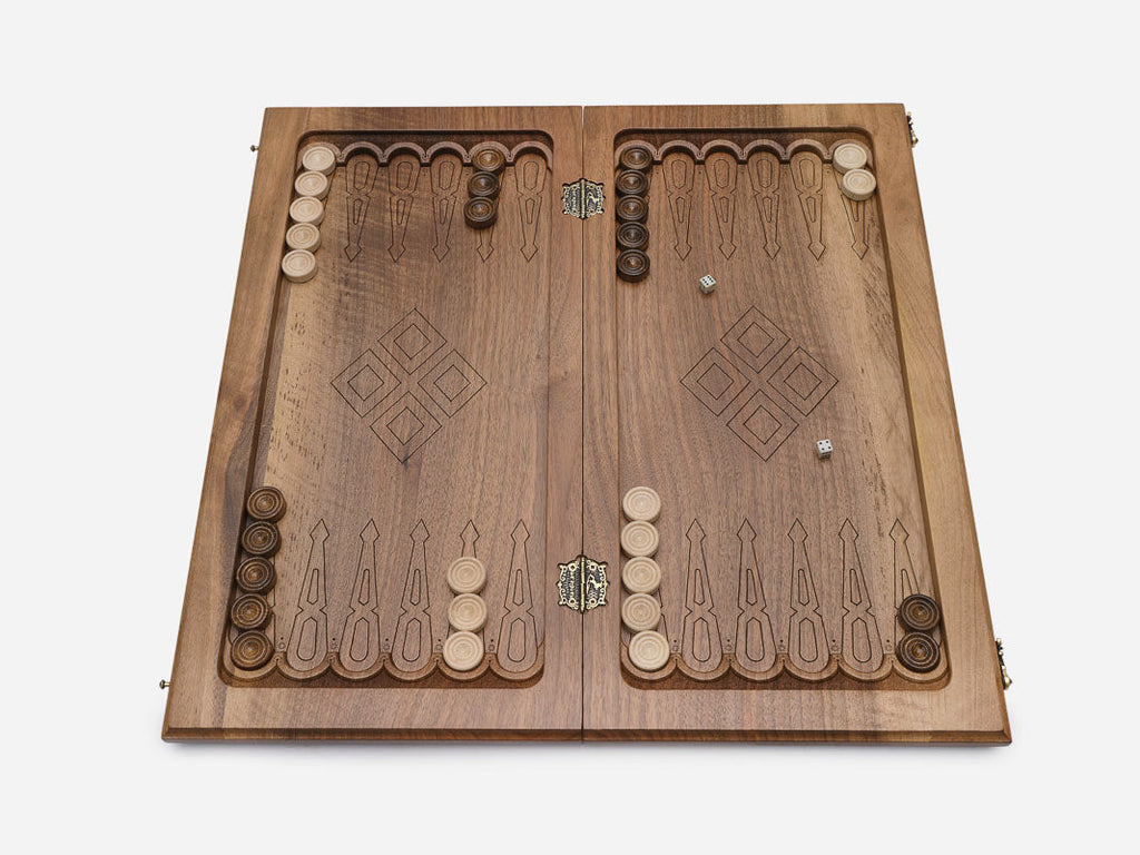 Close-up of the walnut grain and the depth of the diamond carving