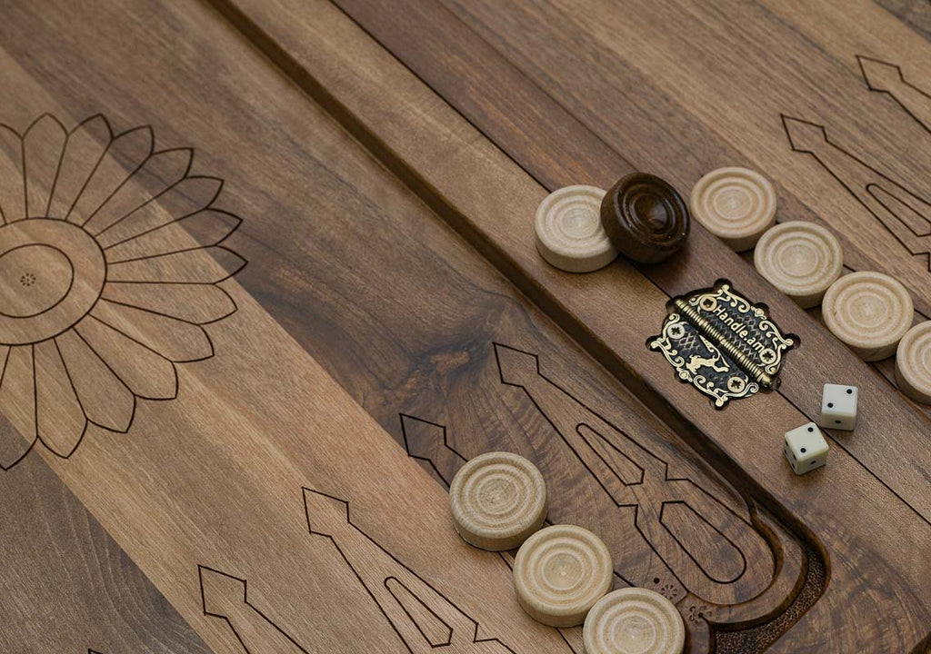 Close-up of the walnut grain and the carved scales
