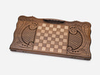 Close-up of the smooth central oval left bare among the carved scrollwork