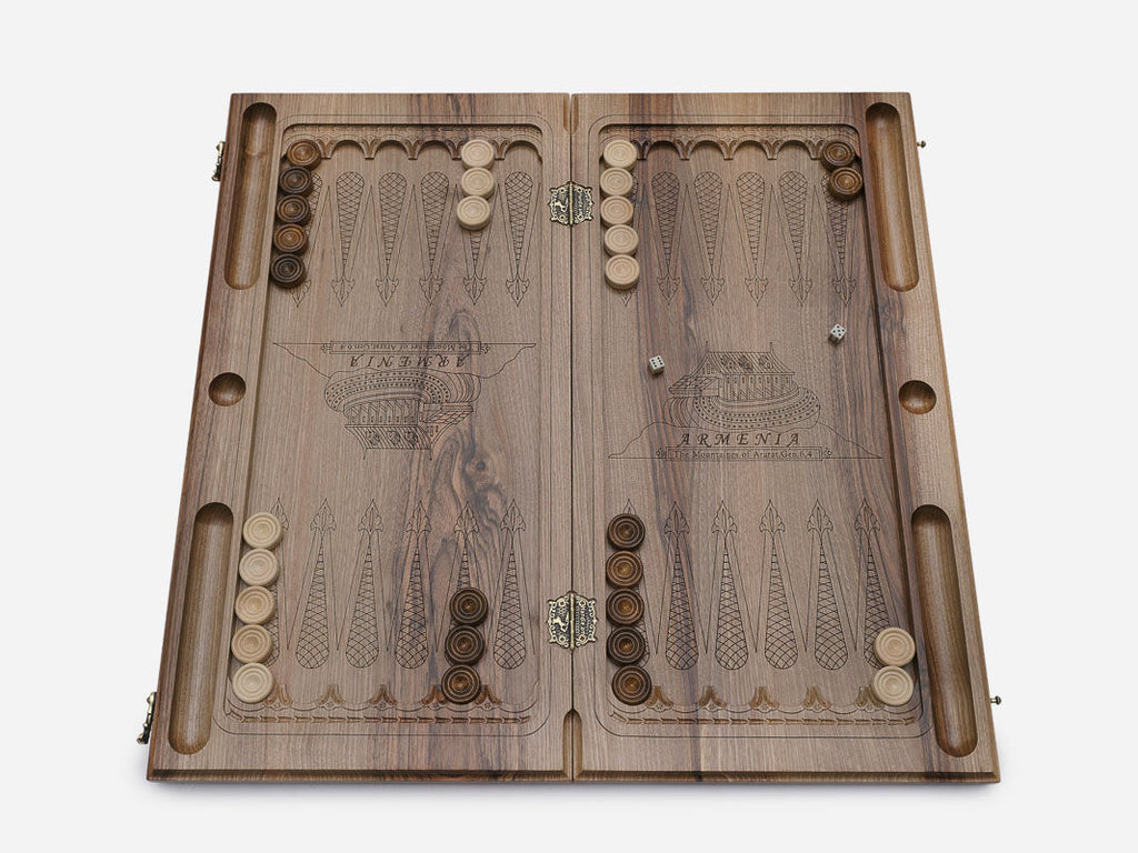 Side view of the folded walnut board showing its bronze hinges