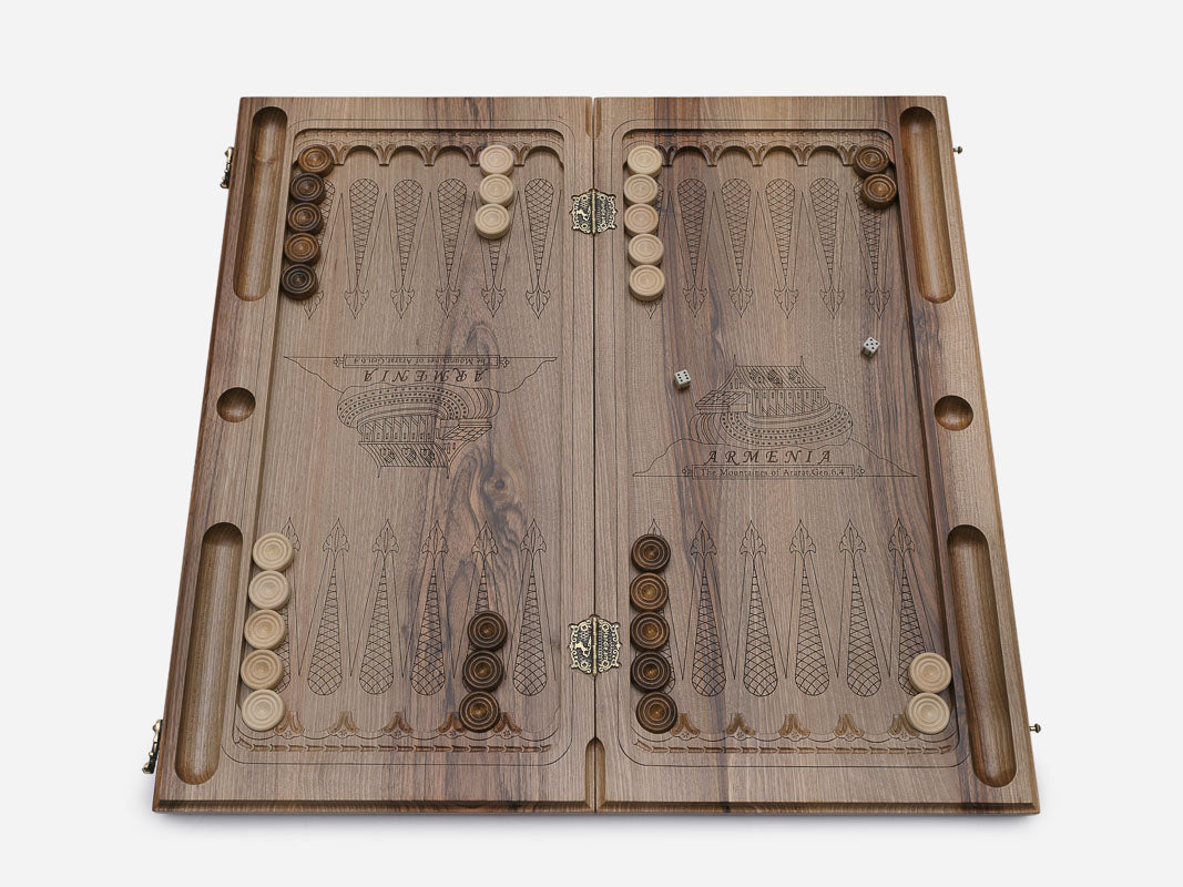 Side view of the folded walnut board showing its bronze hinges
