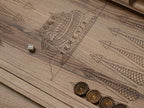 The walnut board folded shut on its clasps