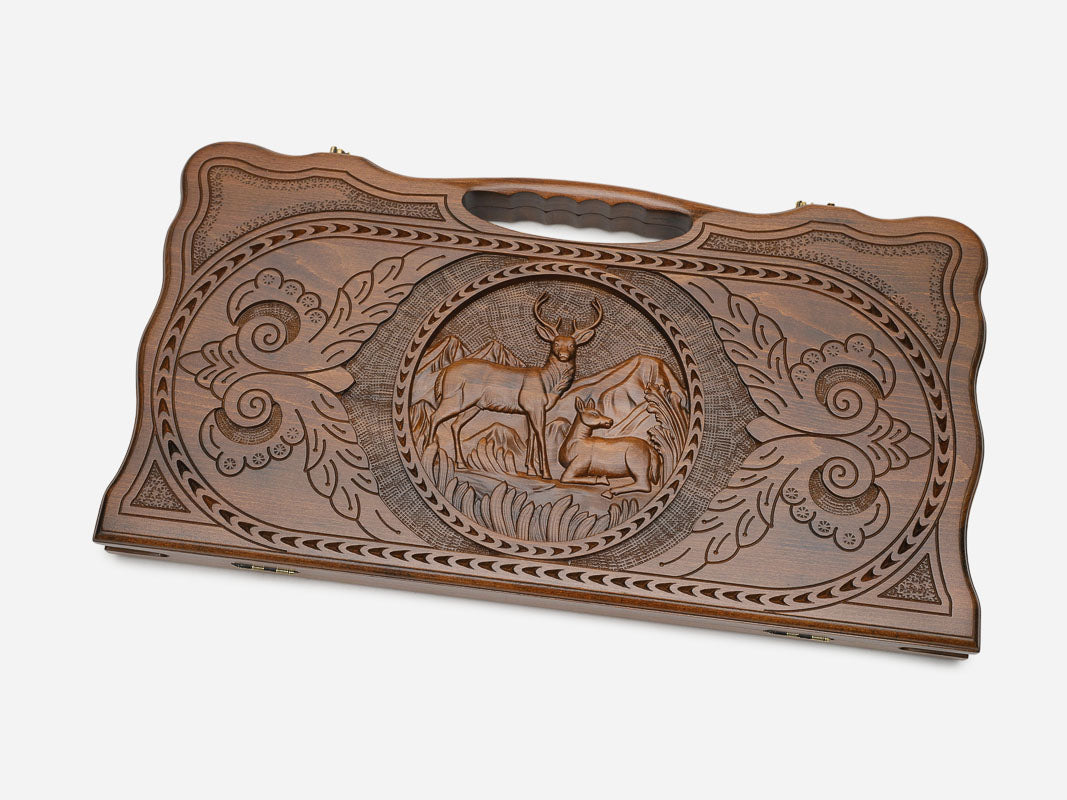 Angled view of the two stags carved backgammon board