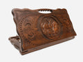Carved beechwood backgammon board with a pair of stags and a carry handle, propped open