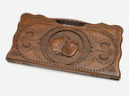 Angled view of the pomegranate carved backgammon board