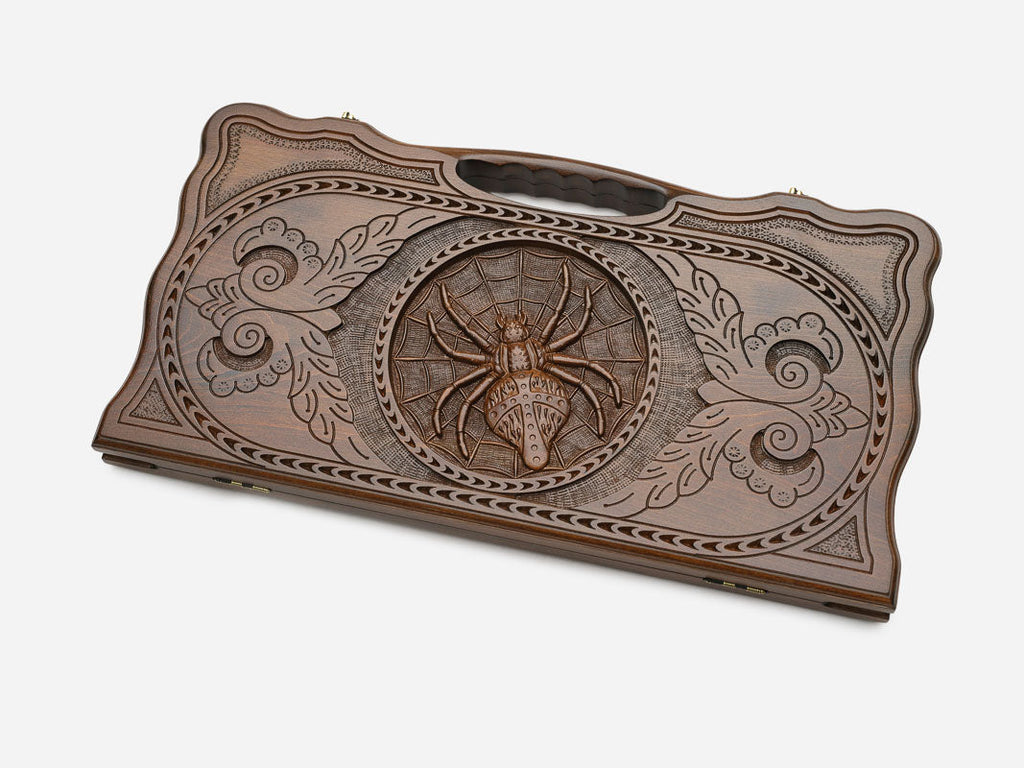 Angled view of the handmade backgammon set showing the carved lid
