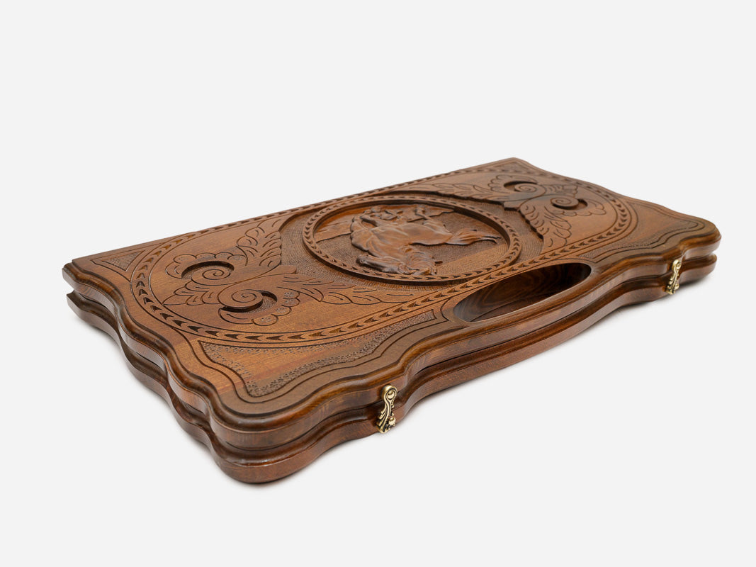 The braided border carved around the edge of the board