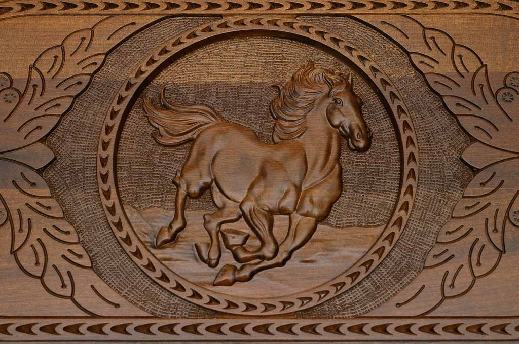 The cut-out carry handle and the upper carving of the lid