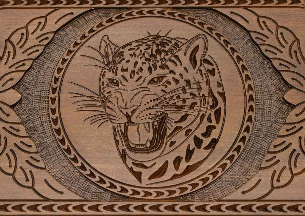 The braided border carved around the edge of the board