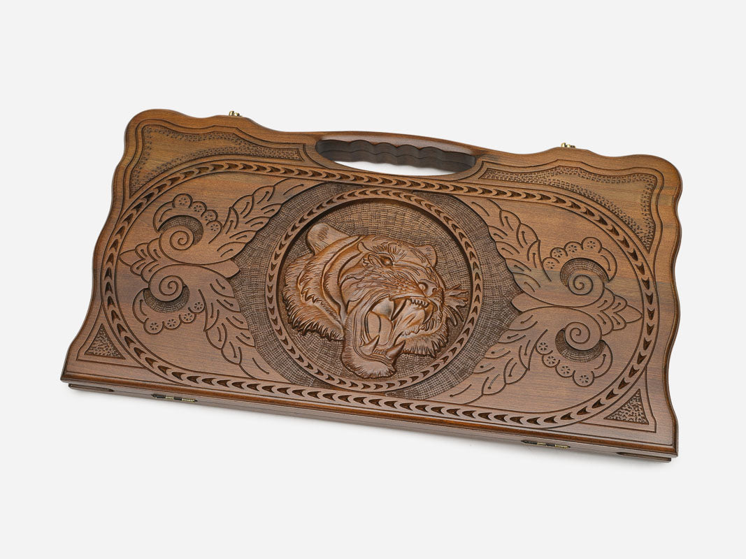 Angled view of the handmade backgammon set showing the carved lid