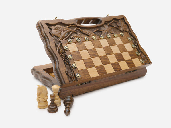 Walnut chess set with pomegranate and grapevine carving