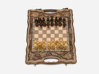 Hand-carved fruit emblems on the travel board