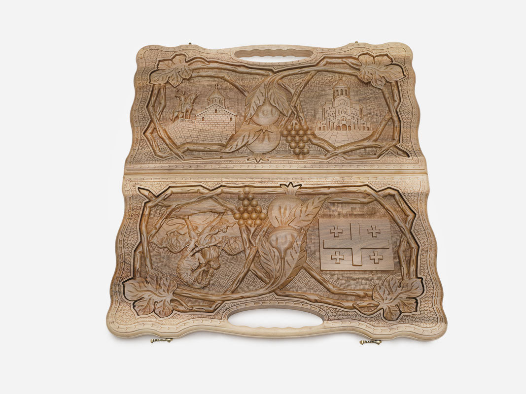 Detail of the carved grapes and pomegranates