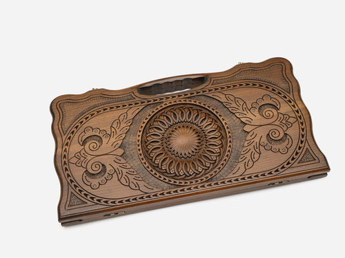 Angled view of the handmade Armenian backgammon set showing the carved lid