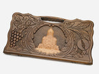 Angled view of the handmade Georgian backgammon set showing the carved lid