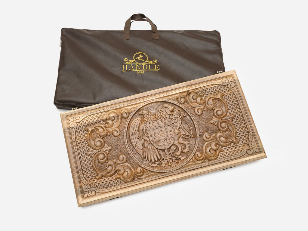 Coat of arms walnut backgammon set with 32 checkers, dice and carrying bag