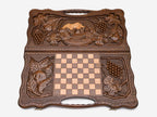 The cut-out carry handle and the carved border of the board