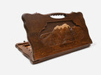 Carved Armenian backgammon board with the Vahanavank monastery among mountains and a cut-out carry handle, propped open