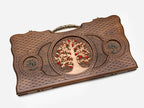 Angled view of the backgammon set showing the bronze handle along the top edge