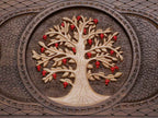 The ornate cast bronze carry handle fitted to the board