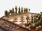 Close-up of the castle rook and royal figures on the Chess Royal Circle board