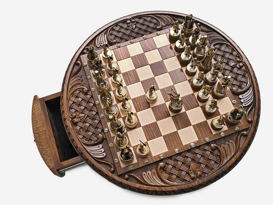 Royal Circle chess set top-down view with pieces set up and drawer open