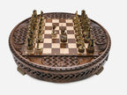 Royal Circle round chess board with pieces in starting position, closer front view
