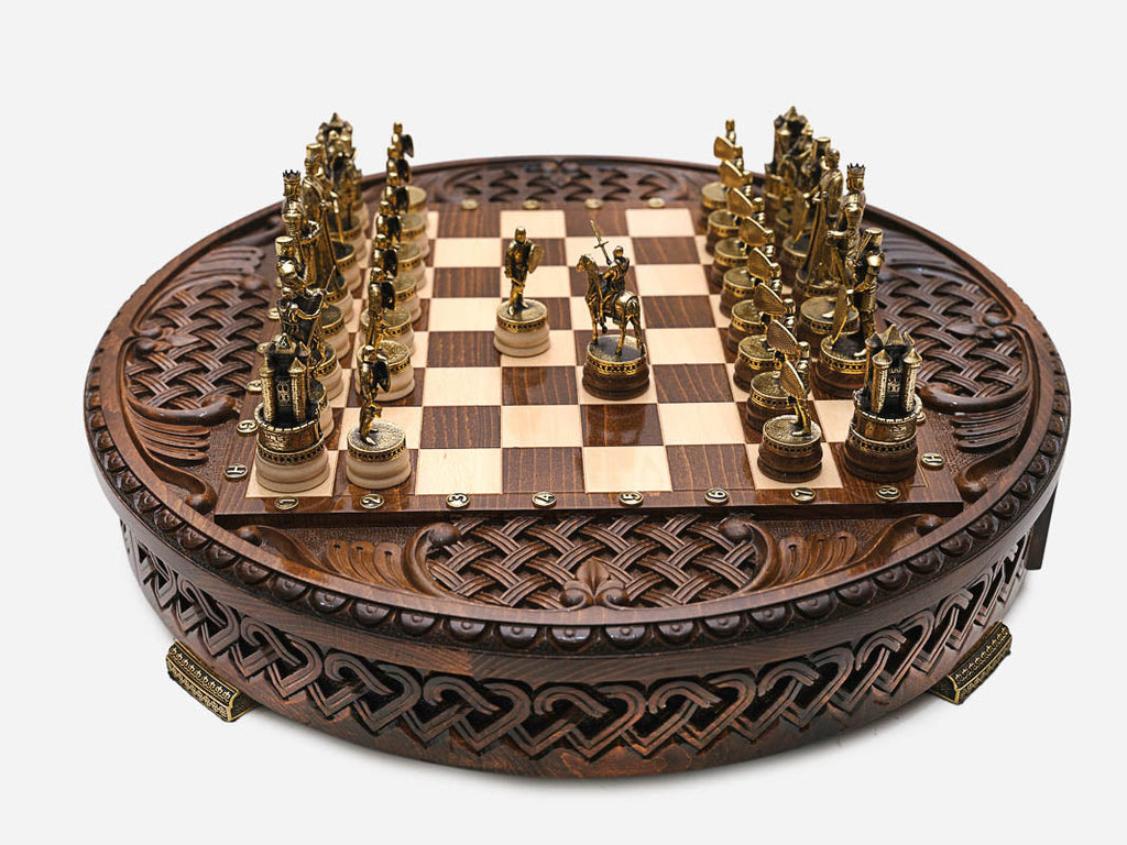 Royal Circle chess set with gold knight pieces facing off across the round board
