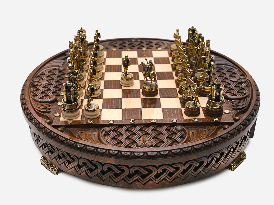 Royal Circle chess set with gold knight pieces facing off across the round board