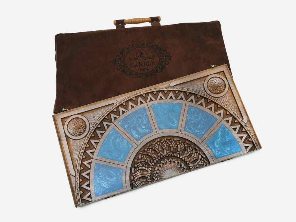 The blue epoxy backgammon board shown closed