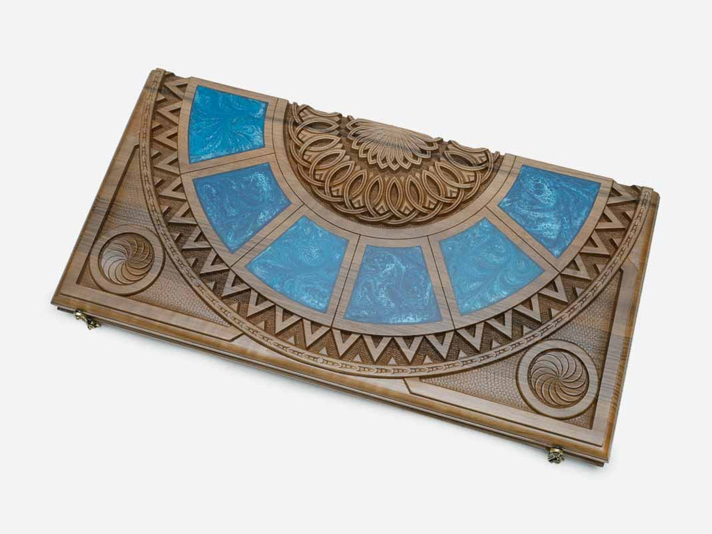 Angled view of the blue epoxy backgammon board