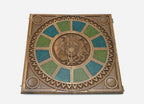 Detail of the green and teal marbled epoxy panels and triangular carved border