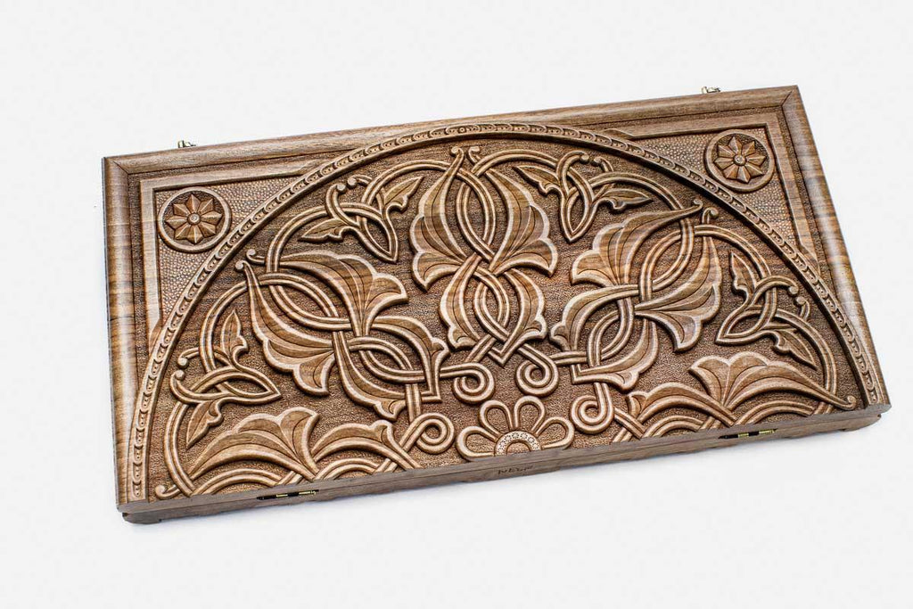 Master-carved walnut backgammon board, side view