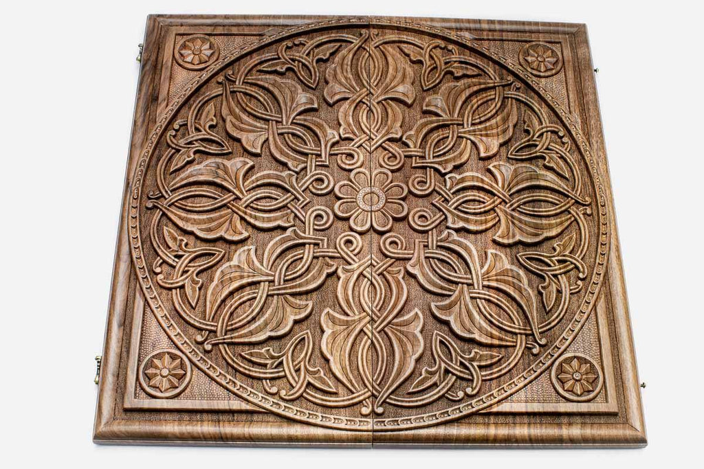 Walnut backgammon board folded closed showing the carved lid