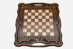 Close-up of the turned beech and walnut chess pieces on the inlaid squares