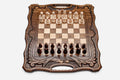 Armenian walnut chess set with carved scrollwork borders and a Mount Ararat inlay, pieces in starting position