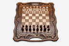 Armenian walnut chess set with carved scrollwork borders and a Mount Ararat inlay, pieces in starting position