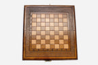 Clean hand-carved border on a classic wooden chess board - detail