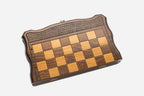 Travel chess and backgammon set folded with bronze hinges and clasps