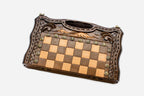 Bronze chess pieces on wooden bases - luxury chess set detail