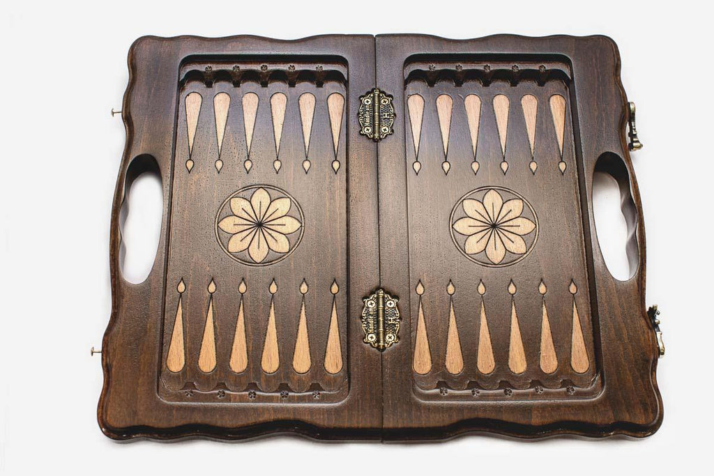 Lattice chess set folded into its case with built-in carry handle