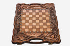 Angled view of the pomegranate harvest chess set with its beech and walnut pieces