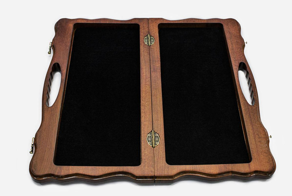 Overhead view of the folding chess board and the full set of 32 pieces