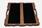 Overhead view of the folding chess board and the full set of 32 pieces