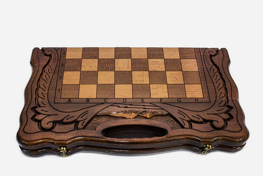 Close-up of the turned chess pieces on the maple and walnut inlaid squares