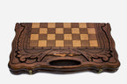Close-up of the turned chess pieces on the maple and walnut inlaid squares